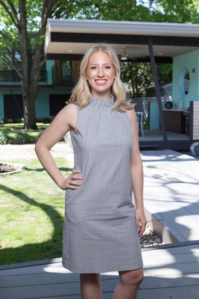 Outdoor professional headshot of an Austin real estate agent