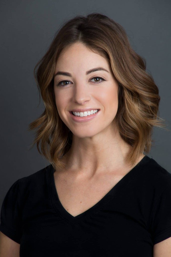 Studio headshot with clean backdrop